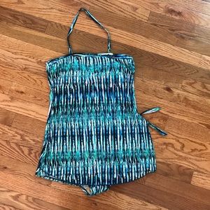 Slimming swimsuit with a skirt in front